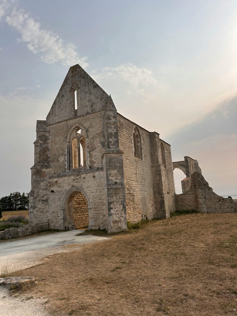 Explore the historic stone ruins, a timeless architectural marvel, under a partly cloudy sky.